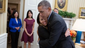 Obama Uses Hugs, Kisses to Ease Ebola Fears